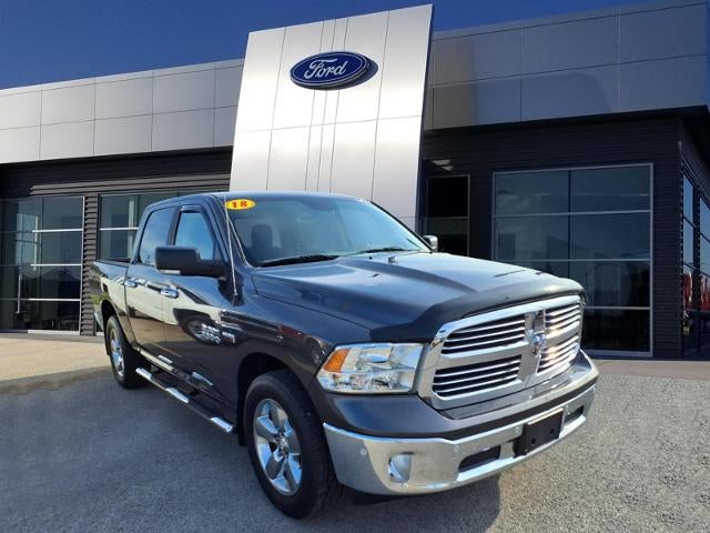 2018 RAM 1500 SLT in Granite Crystal Clearcoat Metallic — front three-quarter view