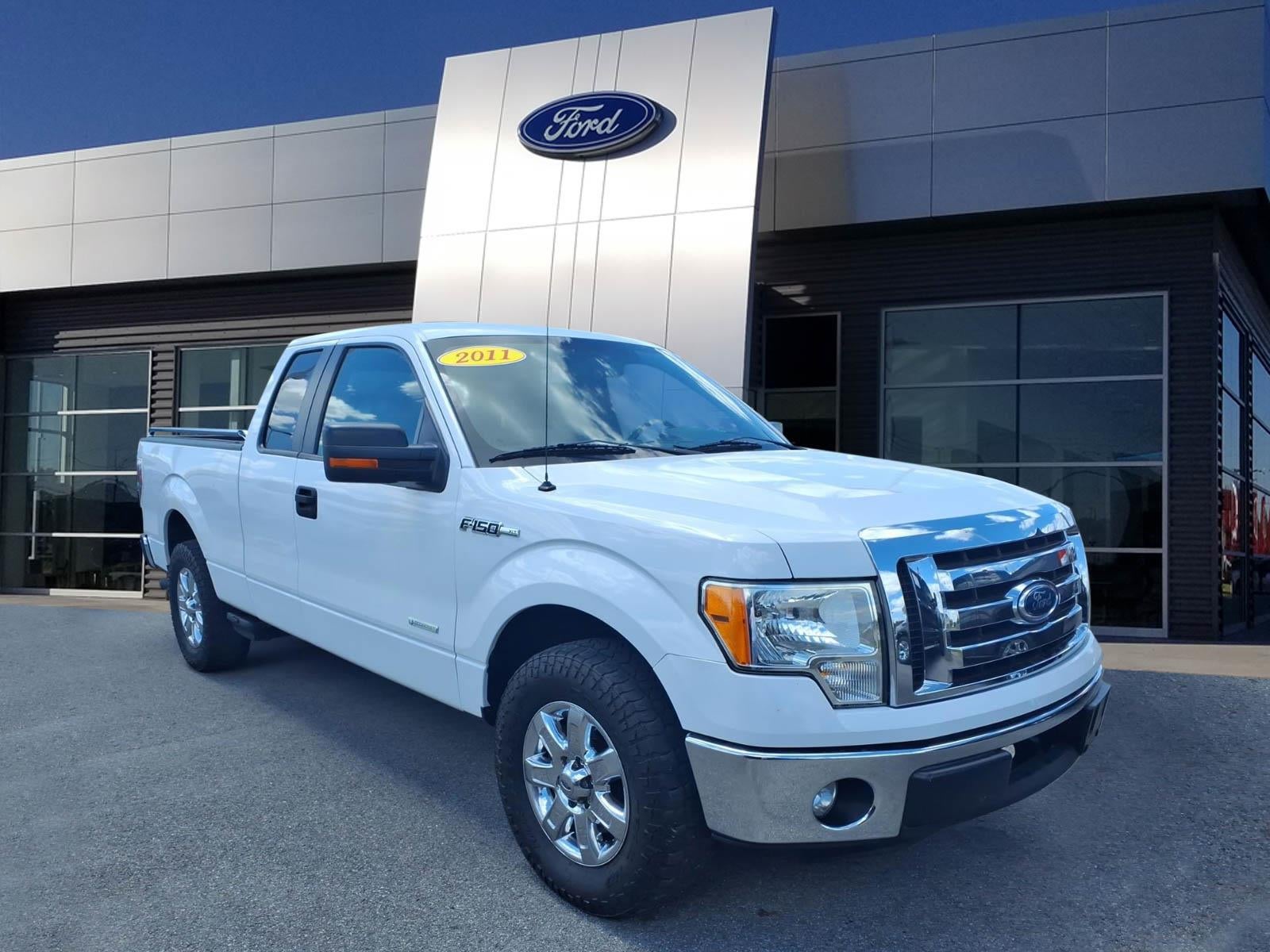2011 Ford F-150 XLT in Oxford White — front three-quarter view